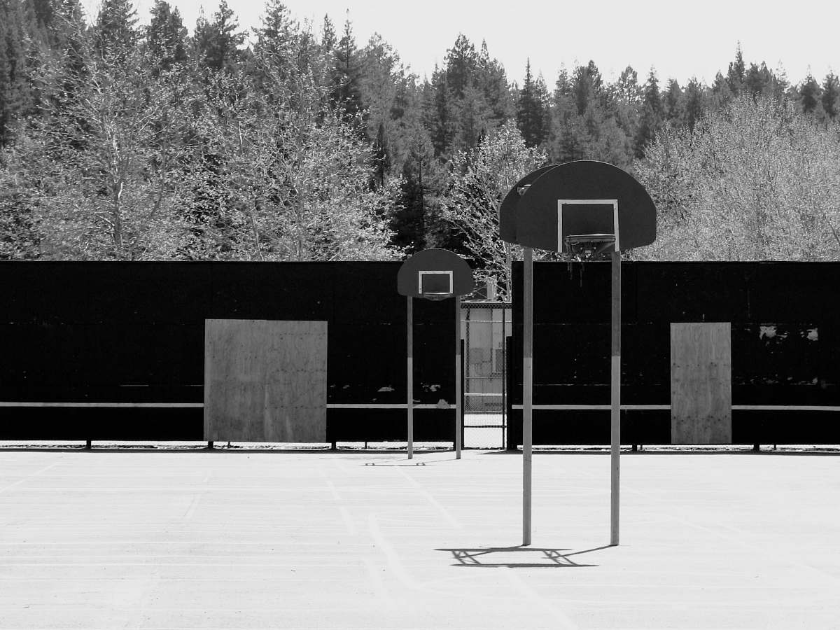 basketball court greyscale photo of basketball court sport